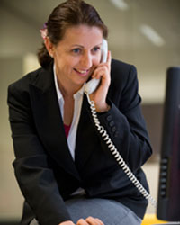 Faculty of IT staff member on the phone